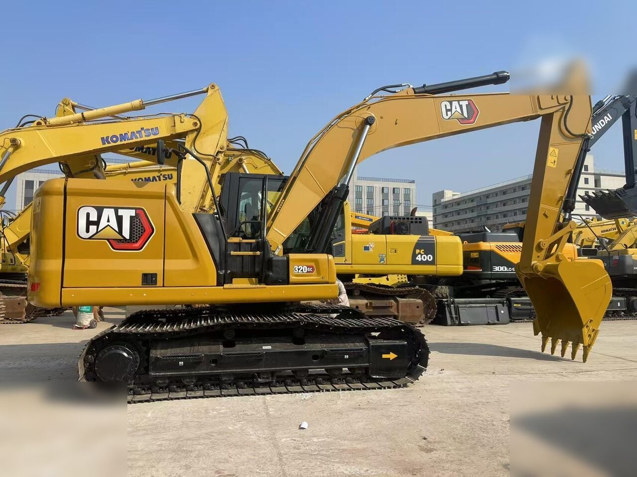 2024 Caterpillar 320GC crawler excavator, side profile view