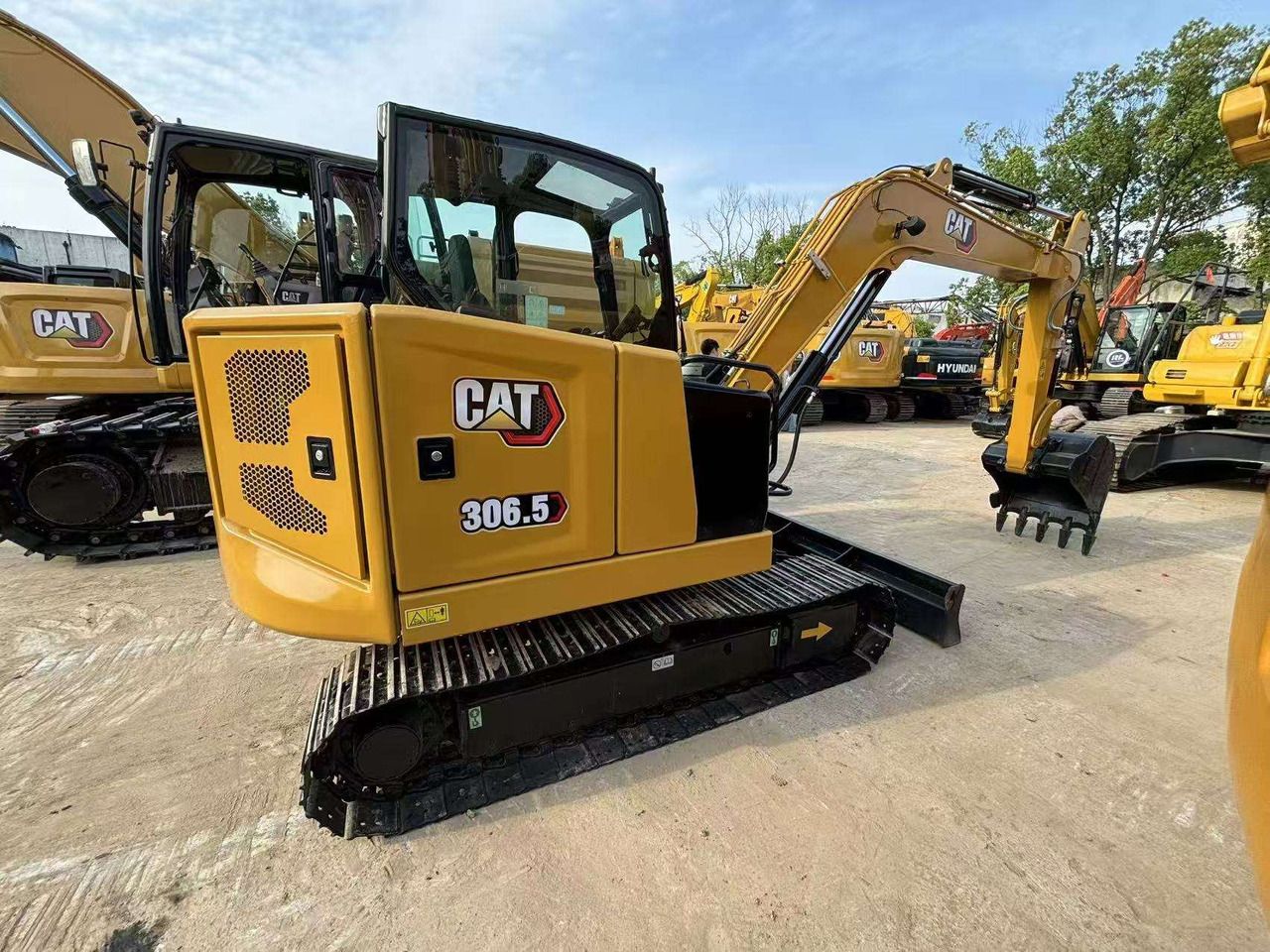 2024 Caterpillar 306.5 crawler excavator, side view 2024 Caterpillar 306.5 crawler excavator, side view