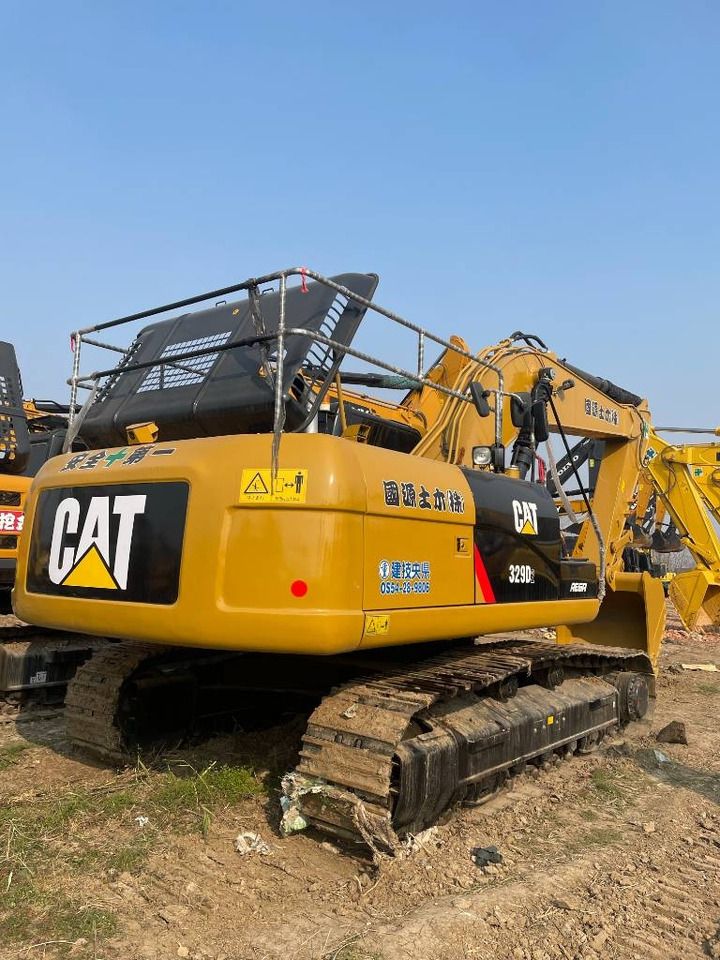 2024 Caterpillar 329D crawler excavator, rear three-quarter view 2024 Caterpillar 329D crawler excavator, rear three-quarter view