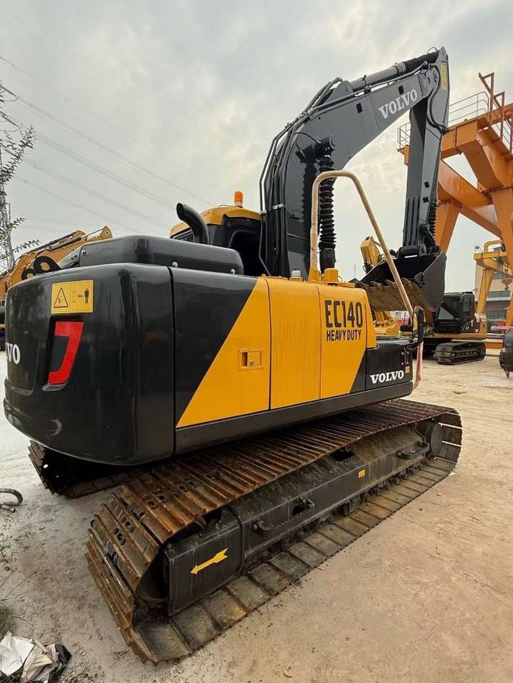 2024 Volvo EC140 crawler excavator rear three-quarter view 2024 Volvo EC140 crawler excavator rear three-quarter view