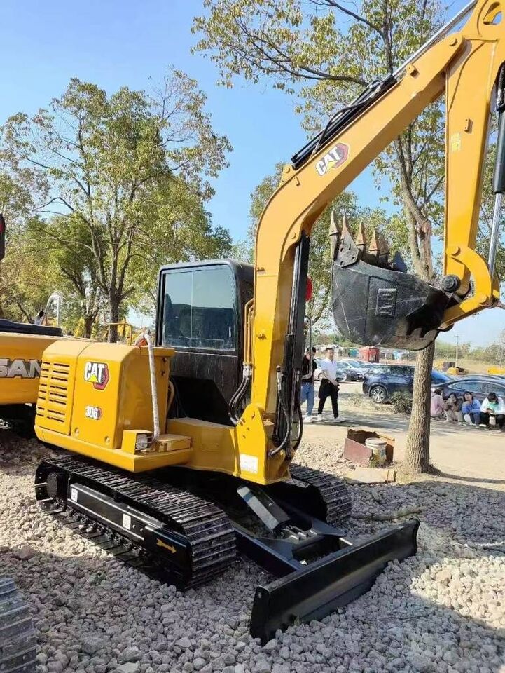 2025 Caterpillar 306 mini excavator, rear three-quarter view 2025 Caterpillar 306 mini excavator, rear three-quarter view
