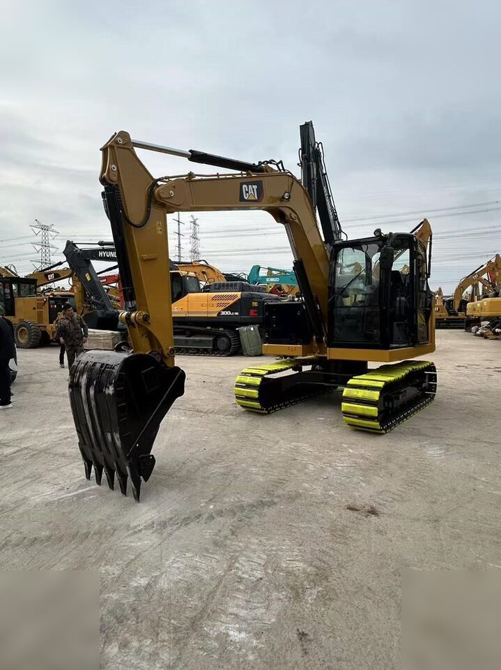 2025 Caterpillar 307.5 crawler excavator, front three-quarter view