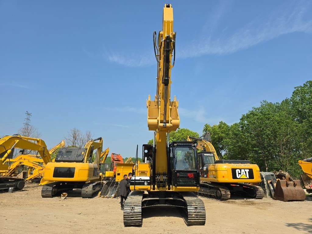 2023 Caterpillar 320D2 mini excavator, rear view