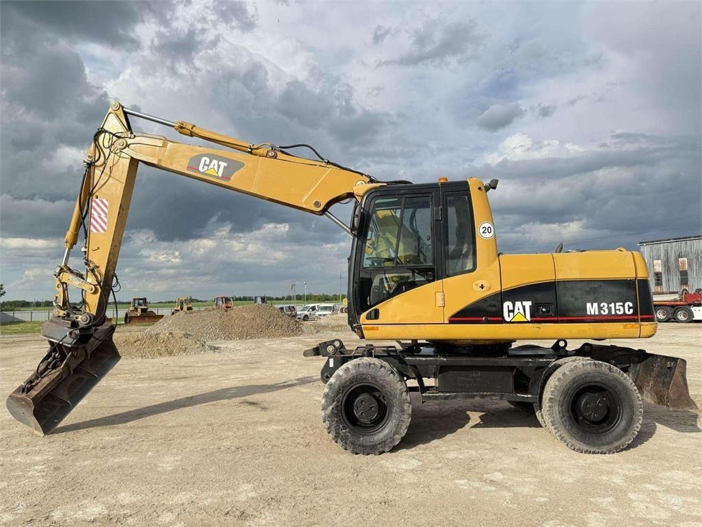 2006 Caterpillar M315C Колесный экскаватор