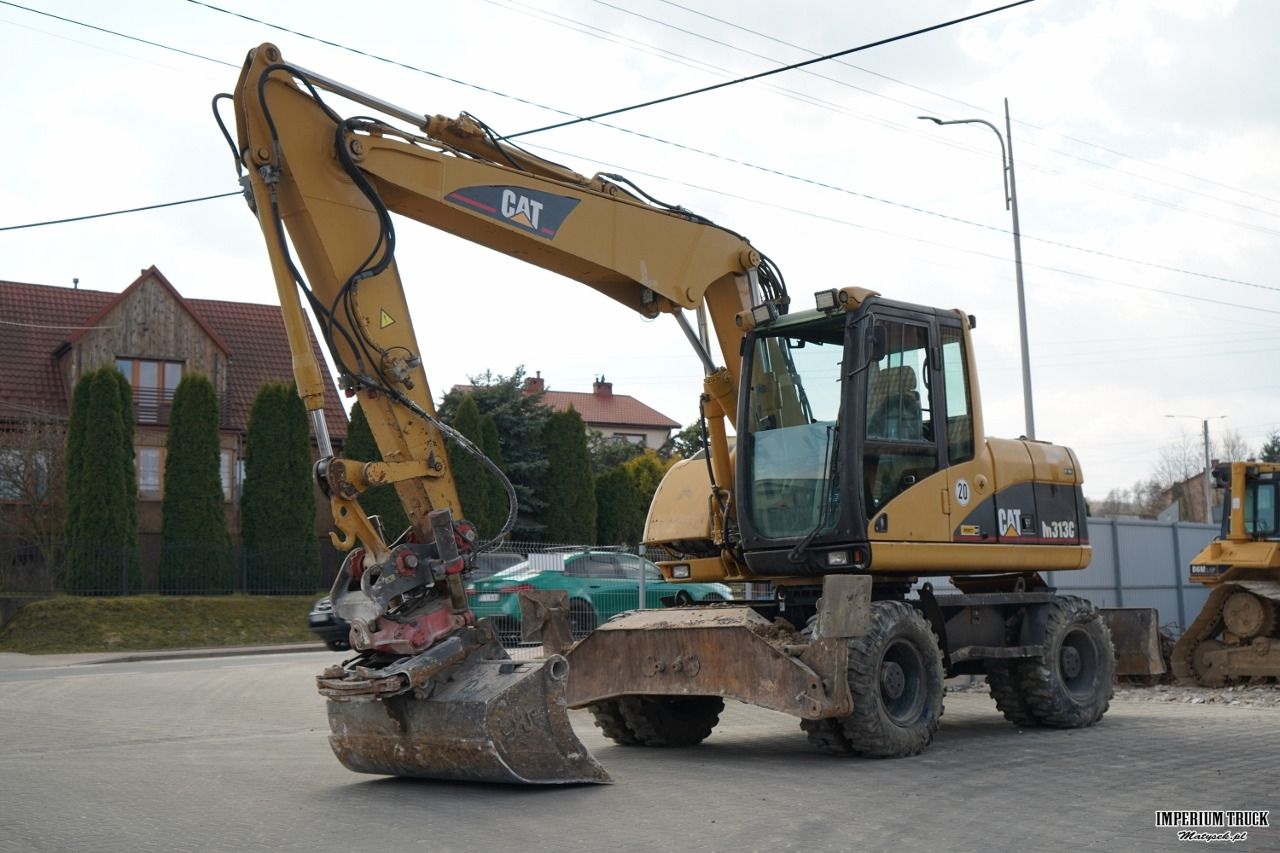 2003 Caterpillar M313C Wielgraafmachine