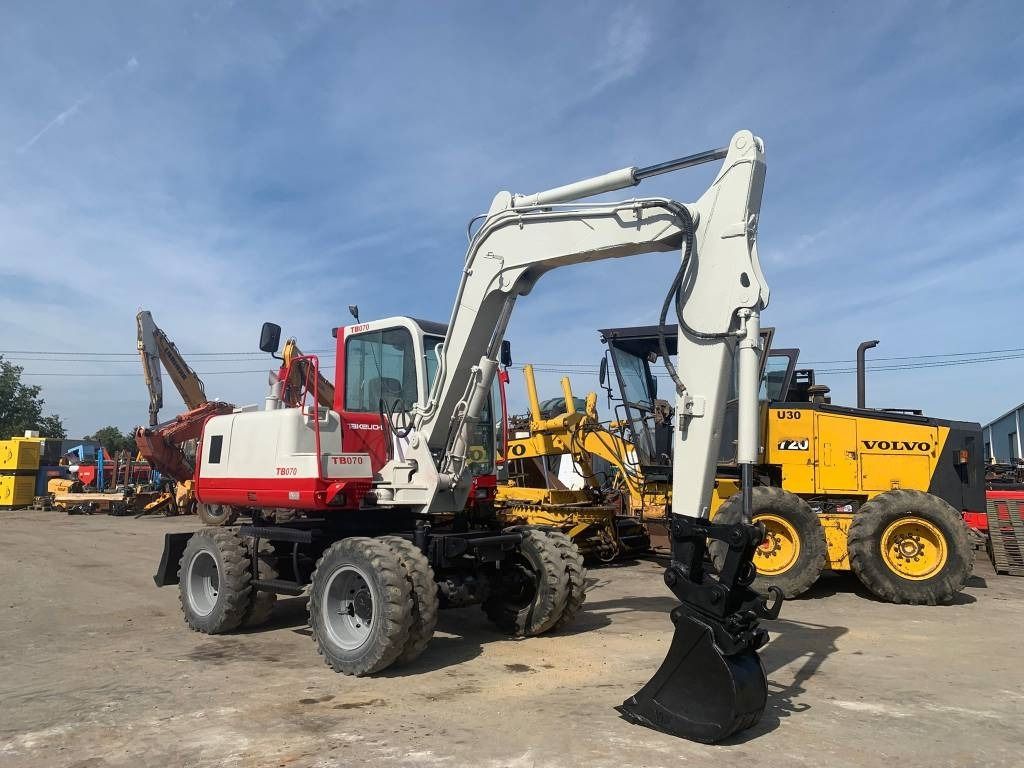 Escavadora de rodas Takeuchi TB070W de 1997