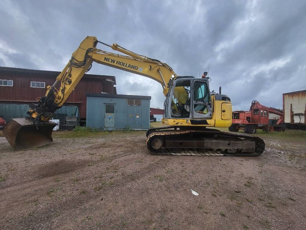 2012 New Holland E235BSR-2 Rupsgraafmachine