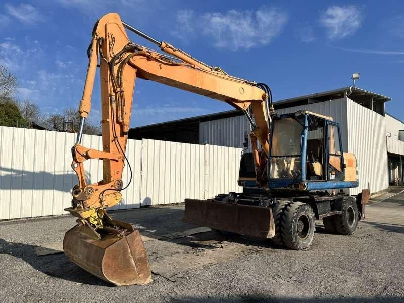 1997 Caterpillar M315 Wiellader Graafmachine