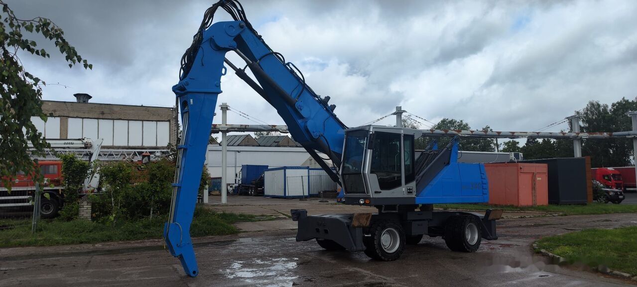 2008 Fuchs MHL340D FQC Préhenseur de matériaux