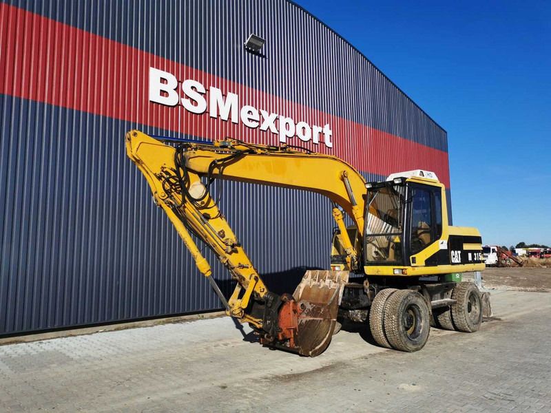 1996 Caterpillar M315 Wielgraafmachine