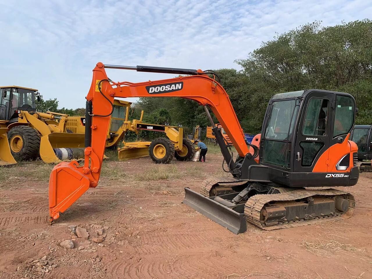 2018 Doosan DX55-9C excavator side view 2018 Doosan DX55-9C excavator side view