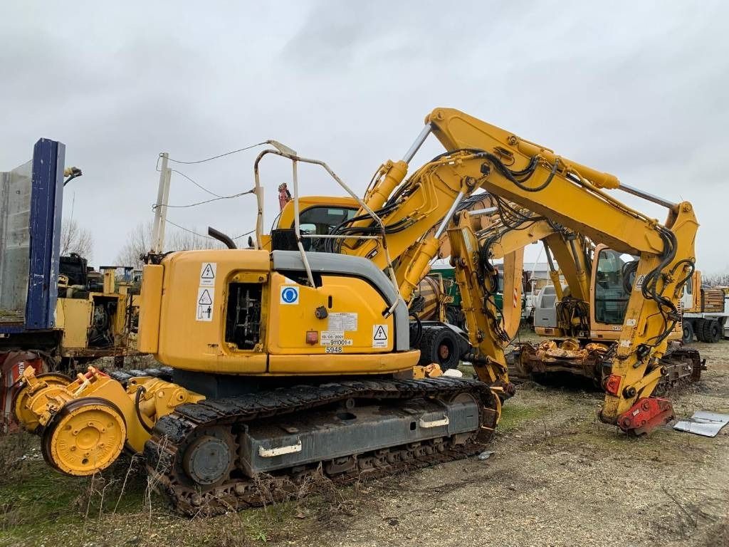 2006 New Holland E135SR-1ES Rupsgraafmachine