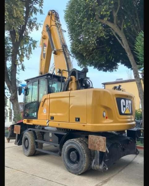 2018 Caterpillar MH3022 material handler, rear three-quarter view