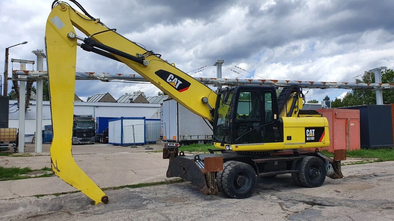 2011 Caterpillar M318D MH Маніпулятор для Матеріалів