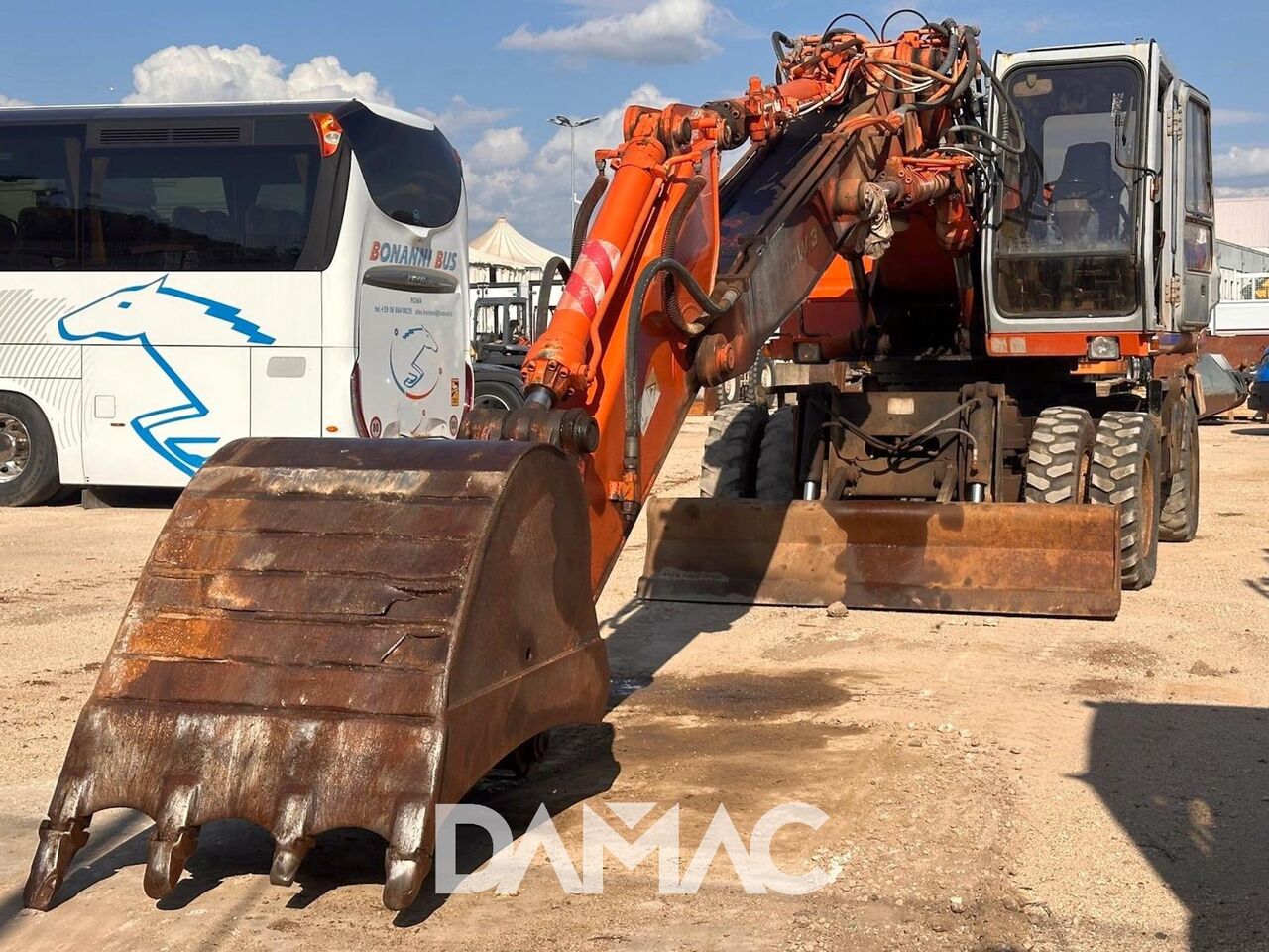 Excavator pe roți Fiat-Hitachi FH200W.3 din 1995