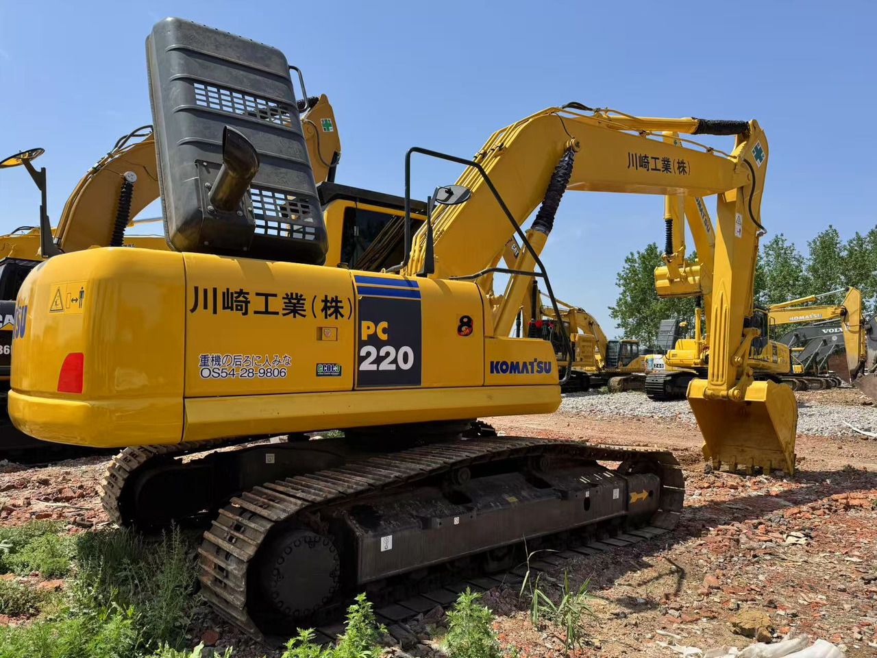 2024 Komatsu PC220 crawler excavator, rear three-quarter view