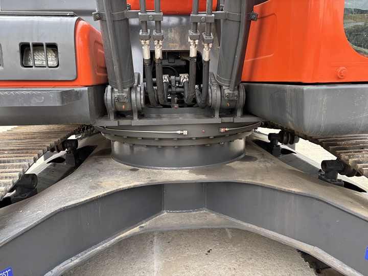 2020 Doosan DX225LCA crawler excavator swing bearing and undercarriage detail