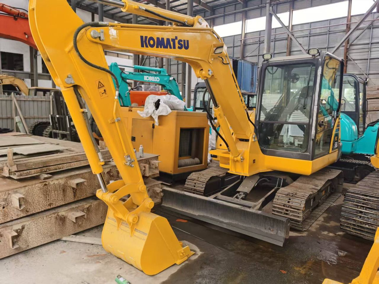 2015 Komatsu PC58 mini excavator, front three-quarter view
