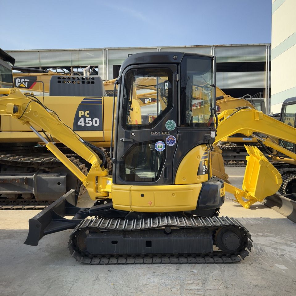 Komatsu PC35MR-2 mini excavator, side view Komatsu PC35MR-2 mini excavator, side view