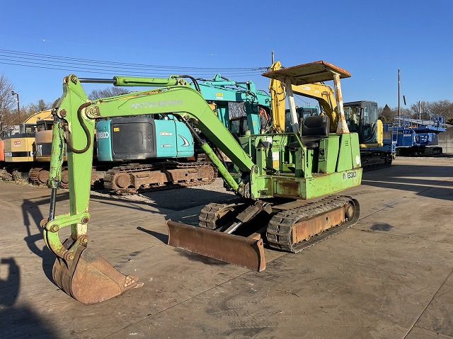 Mitsubishi ME30 mini excavator, side view Mitsubishi ME30 mini excavator, side view