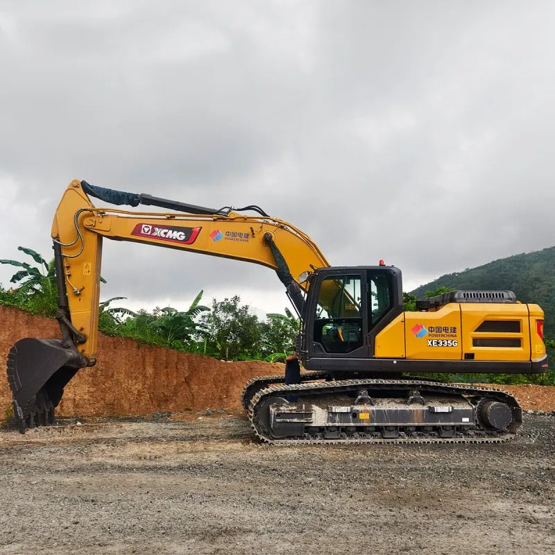 2026 XCMG XE335G Crawler Excavator with its full boom and arm extended forward, showing the digging bucket.